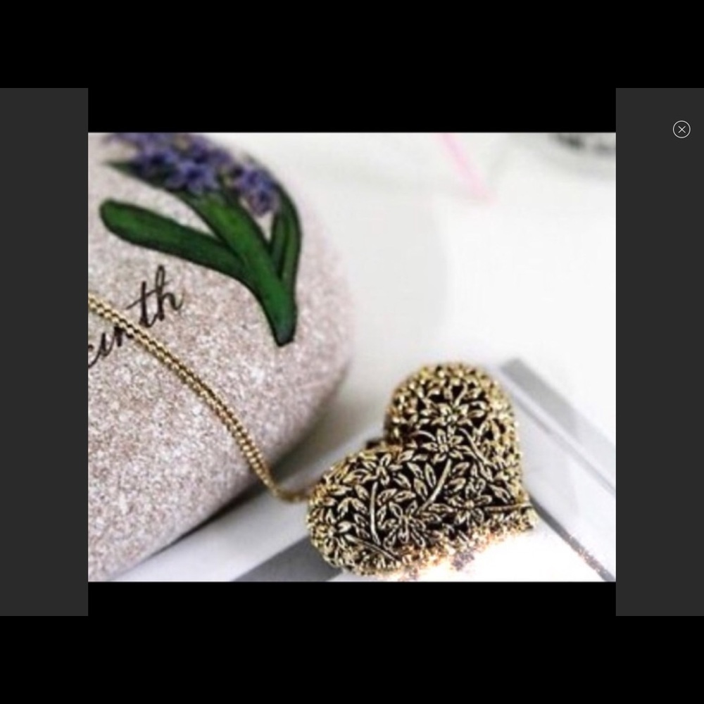 Antique gold filigree heart necklace.